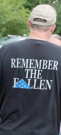 Many of those who attended wore shirts demonstrating support for the police.