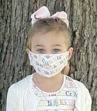 Mary Luciana shared these photographs of her granddaughter Victoria Pacciulo going to kindergarten at Chester Elementary School in her matching alphabet dress and mask.