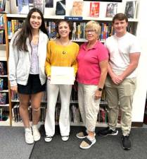 Shannon Sgombick, Haley Carmack, Florida Chamber of Commerce Scholarship Committee Chairperson Marie Pillmeier, and Andrew Finnerty.