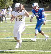 Warwick quarterback Nick DiMarco scores a touchdown again Goshen last Saturday, Sept. 11, in the Spirit Trophy Game played in Goshen. Photo by Tom Bushey/WVSD.