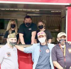 Pictured from left to right, beginning with the people in the food truck: Jacqueline Wilson, Connor and Cassie Wilson of Smokin Grate BBQ; and in front: Carmine Garritano, Warwick Valley VFW Post 4662; Tracy Gregoire, Small Things Inc.; and Jose Morales, Warwick Valley VFW Post 4662. Photo provided by Tracy Gregoire.
