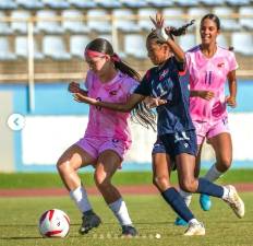Warwick resident Xylia Martinez (#11 in blue) will play for the Dominican Republic in the 2025 Caribbean Football Union U14 Girls Challenge Cup this weekend.