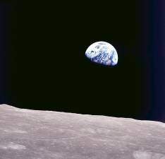 The Earthrise image was taken by Apollo 8 astronaut Bill Anders on Christmas Eve 1968. Apollo 8 marked the first time humans left low Earth orbit and flew to the moon. William Anders/NASA via AP
