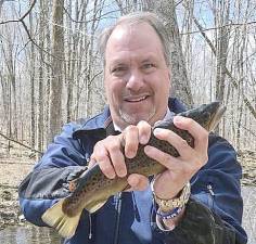 District Attorney David Hoovler helping the Orange County Federation of Sportsmen to stock trout. Provided photos.