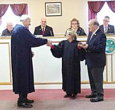 Warwick Town Justice Peter Barlet conducted a special swearing-in ceremony for colleague Nancy DeAngelo, aided by the Bible Holder, Town Councilman and husband Floyd DeAngelo. In 1999, DeAngelo became the first female judge in Greenwood Lake and continued in office for 16 years until 2015. Then in 2008, she became the first female judge in the Town of Warwick, overlapping two terms with the village court. DeAngelo has continued as the town judge to date. The ceremony was held in Warwick Town Hall on Jan. 2, 2020