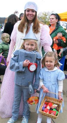 Photo by Roger Gavan Wizard of Oz characters: Gina Casale as Glinda the Good Witch of the North with Elaina Schlesinger, 5, as the tin man and her sister Julia, 3, as Dorothy.