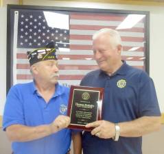 On Wednesday, July 14, Greenwood Lake American Legion Arthur Finnegan Post 1443 held its monthly meeting. Current Commander Gerry Brewer presented a plaque to former Commander Thomas (Tom) Mulcahy for his two-years of service and outstanding leadership and dedication, especially during the pandemic. Pictured from left to right: Gerry Brewer presents the plaque to former Tom Mulcahy. Photo by Ed Bailey.