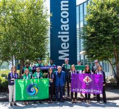Thirteen college students recently completed the 10-week long summer internship program at Mediacom’s Blooming Grove headquarters. They are pictured here with Rocco Commisso, founder, chairman and CEO of Mediacom.