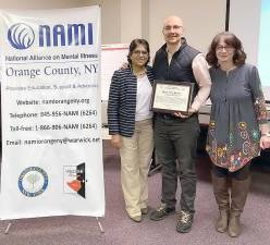Green Team Realty receives NAMI Orange Appreciation Award. Pictured from left to right are: Dhanu Sannesy, president of NAMI-ORANGE, Geoffrey Green, president of the Green Team Realty and Susan Wynn.