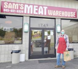 Owner Stephan Kitar outside Sam’s Meat Warehouse at Remee Plaza, 468 Route 17A in the Village of Florida. Photo by Terry Gavan.