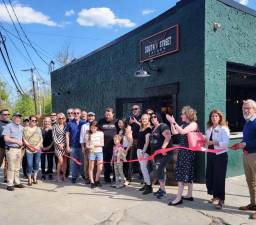 The Warwick Valley Chamber of Commerce recently hosted a ribbon-cutting at the new South Street Saloon with owners Patrick and Hazel Corcoran. A group of Chamber board members, elected officials and supporters were there to cut the ribbon and wish them well. Sen. James Skoufis also sent a certificate of recognition welcoming the new business.