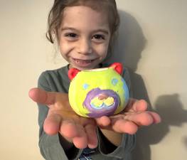 For younger attendees, the Kids’ Art Activity Center offers a hands-on experience where children can paint their own ceramic animal pots and plant flower seeds to take home.