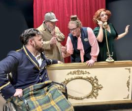 From left: Kevin Bowman, Steve Davis, Sarah Fields, and Nicole Bader on stage for the mystery-comedy, “The Real Inspector Hound.”