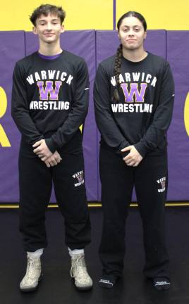 Warwick wrestling program captains Garrett Judd and Victoria Alvarado,