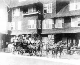 This 1902 picture shows the Wisner four-in-hand “Tally-Ho” coach in front of the Red Swan Inn about to depart on an outing to Goshen for dinner at the St. Elmo Inn. The Red Swan Inn stood to the right of the Warwick Cemetery, where the Warwick Country Club is now located on Oakland Ave. It was razed followed a fire in the 1950s. The St. Elmo Inn in Goshen burned in 1920; it was located near the site of the present post office. Photo courtesy of the Warwick Historical Society.