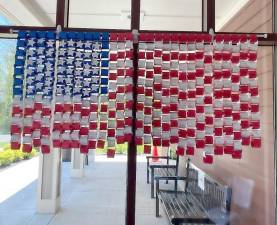 This hand-crafted flag created by Girl Scout troops in Warwick is on display at the Albert Wisner Public Library from Armed Forces Day (May 15) through Memorial Day (May 31). Photo provided by Ann Marie Vitoulis.