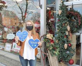 “We’ve had lots of traffic this weekend,” said Nicole Repose, owner of Etched in Time Engraving. “It’s been very good and our customers, who waited outside to enter our store in limited numbers and keep everyone safe, were understanding and very cooperative.” Photos by Roger Gavan.