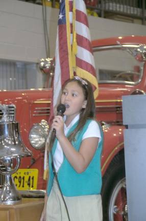 Young singer Sky Clifford sang “God Bless America”.