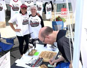 Greenwood Lake Centennial Committee Thais Pilieri and Marilyn Hayden during the Greenwood Lake Annual Street Fair on June 10, 2023.