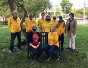 On Monday, Sept. 14, the Warwick Lions Club donated the newest bench to the Town of Warwick Historical Society. Standing from left are: George McManus, Cory Bachman, Ryan O’ Leary, Christine Adams, Kathy McManus, Hakima Al-Zahra and Historical Society President Mary Ann Knight. Seated from left, Warwick Historical Society Executive Director Nora Gurvich and Carol Buchanan. Provided photo.