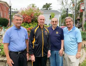 Jack Ellis, left, and Master Doug Cook, representing the Youth Leadership Team of the Chosun Taekwondo Academy, are Warwick’s 2019-2020 Outstanding Community Service Award winners. They are shown with Leo Kaytes Sr. and Stan Martin, co-chairs of the Warwick Citizen of the Year Committee.