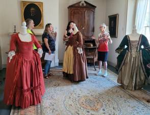These exquisite gowns are on display in the upstairs ballroom at Baird’s Tavern, 103 Main Street as part of the Warwick Historical Society’s “Eleven Ladies of Warwick” historic exhibit, open to the public on Saturday, Aug. 19, from 12 to 3 p.m. This exhibit has a limited viewing until September.