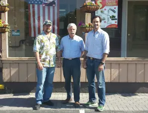 Arnold Bieling (center) with sons Tim and Scott.