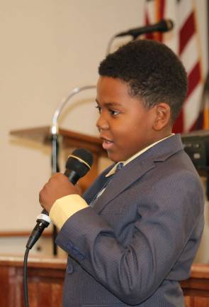 Photos by Roger Gavan The &quot;Voice of our children&quot; presentations featured Isaiah Huff (pictured here) and N'darri Posey.