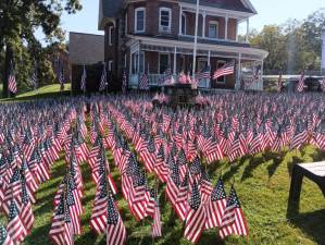 The Florida Fire Department, with help from Mayor Dan Harter Jr. and Village Trustee Alyssa Werner, placed flags in front of Florida Village Hall over this Labor Day weekend. This is a yearly event organized by the Fire Department’s 9/11 committee (Sal Puglisi and Anne Ossentjuk) to honor the victims of 9/11. There will be a ceremony on Monday, Sept. 11, at 7 p.m., at the Fireman’s Memorial between Village Hall and the Florida Fire Department. Photo provided by Anne Ossentjuk.