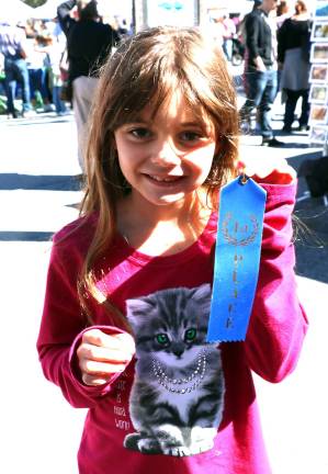 First Place Junior Winner: Olivia Frawley (pictured here) and Olivia Cupo (not present for the photo), 8 year olds, from Greenwood Lake.