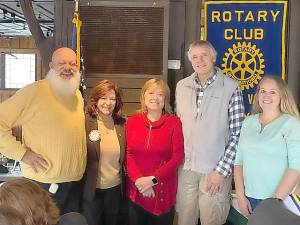 The Warwick Valley Rotary shared winter coats with leaders of the Warwick Area Migrant Committee at the last meeting of the year. From the left, Rotarians Wayne Patterson, President Tina Buck, Katherine Brieger and Joseph Maggio of the Migrant Committee, and Rotarian Laura Barca.