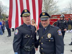 Passing the torch of Warwick police leadership, Chief Tom McGovern, left, was high in praise for his long-term assistant and new Warwick Police Chief Lt. John Rader. Photo: Stanley Martin.