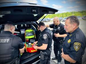 Fly-Car members completing the daily Part 800 equipment check.