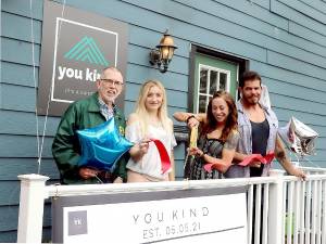 On Wednesday, May 5, Town of Warwick Supervisor Michael Sweeton and members of the Warwick Valley Chamber of Commerce joined owner Amanda Johnston and her family and friends to celebrate the grand opening of her studio with a ribbon cutting ceremony. From left, Town of Warwick Supervisor Michael Sweeton, You Kind assistant Katieann King, owner Amanda Johnston and Nutrition Specialist John Cupo. Photo by Roger Gavan.