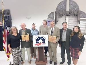 L to R: Roxanne Lopilato, Rumshock Treasurer; Maj. Gen. James E. Livingston; Rumshock Executive Director Robbie Brown; Rumshock Founder and President Bill Whetsel’s son, Tyler Whetsel; Adam Seidner; Rumshock Vice President Peter Lyons Hall; and Rumshock Advisory Council Chair Renée Williams