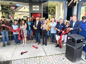 The new Cork Wine Bar in Florida holds its ribbon cutting.