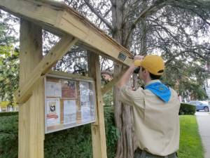 Sean Mitchell worked on his Eagle Scout project, a kiosk on Main St., in Warwick