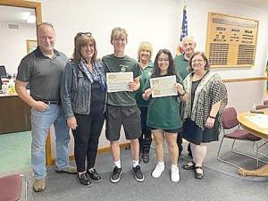 Left to right: Carl and Christine Bodecker with son Alex, Debbie Gorish, Jr Corp advisor; Laura Cook with her mother Tara, and Frank Cassanite, Warwick Ambulance captain.