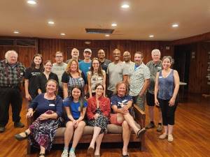 Front row: Hanne Chambers, Sprite Fallon, Carly Foster, and Jim Hall. Middle: Lea Fallon, Kat Leo, Christine Leo, Tim Gamory, Pasquale Leo, and Rekha Shoenfeld-Woods. Back row: Martin Pirringer, Sean Fallon, Joe Morse, Paul Woods, William LeBar, Mark Harris, Sandeep Luke, and Grady Schenck.