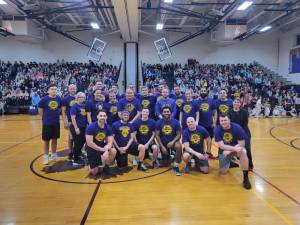 Warwick High School faculty rallies for their first win in three years in the Annual ULTAMANIA Charity Basketball Game on campus Friday, March 8.