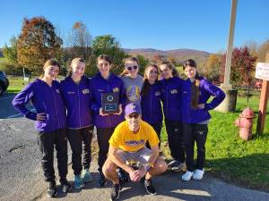 The girls cross country team before the county championship.