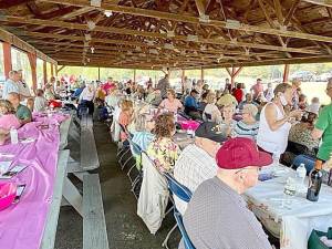 Warwick Senior Barbecue roasts corn and chicken and hosts 800