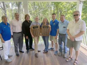 Pictured from left to right, the committee members include co-chairs Stan Martin and Leo R. Kaytes, Frank Truatt, Michael Sweeton, with the Jaycee plaque honoring winners from 1968-1999, Rotary President Laura Barca, holding the Rotary plaque listing recent winners, Jake Tuckfelt, John McGloin and Cal Hargis. The Warwick Citizen of the Year plaques are displayed at Town Hall.