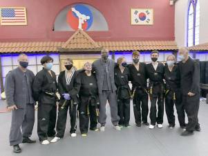 Pictured from left to right at the United Martial Arts Center in Warwick are: Keith Winkle, Sean Chocallo, Sebastian Astorino, Angela Abrams, David Herbert, Robin Yarrington, Christopher Yarrington, Matt Gazzola, Heather Decker and Edmund Ciarfella. Provided photo.