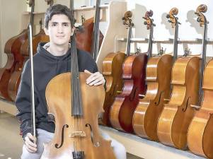 Artist of the Week Benjamin Samberg with his cello at Warwick Valley High School on March 3. Photo y Tom Bushey.