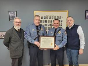(From left) Village of Warwick Mayor Michael Newhard, Warwick Police Department 1st Sgt. Alton Morley, Chief John Rader, and Town Supervisor Michael Sweeton with the Certificate of Accreditation plaque awarded by the New York State Law Enforcement Accreditation Program.