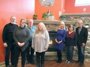 Gathered around the fireplace at Blarney Station in anticipation of the Warwick Valley Chamber of Commerce March 25 mixer, from left, are: Chamber past President John Redman, Office Manager Bea Arner, Office Assistant Lori Cosgrove, Blarney Station owner John O’Connell, Chamber Programs Chairperson Janine Dethmers, Programs Committee Member Vanessa Greeley and Chamber Executive Director Michael Johndrow.