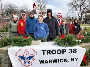 During the village’s recent Home for the Holidays event, Warwick Boy Scout Troop 38 was on hand at Railroad Green selling holiday wreaths they’d assembled. Photo provided by Pam Burgio.