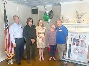 Lisa Kevins and Marge King-Porter have been installed as new members of the Warwick Valley Rotary Club. They join the service organization’s growing number of community volunteers, which now numbers in the 60s. Shown, left to right, are Leo R. Kaytes, club president; Frank Truatt, who sponsored Kevins; Lisa Kevins; Marge King-Porter; and her sponsor, Stan Martin, who performed the installation ceremony. Warwick Rotarians are local residents who believe in giving back to their community and have as their motto “Service Above Self.” They donate time and money to almost three-dozen community organizations and projects plus provide scholarships to deserving youth. They meet every Wednesday noon at the Landmark Inn. Prospective members are invited to attend. Photo by Wayne Patterson.