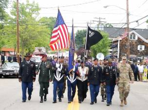 New York Task Force Commander Col. Peter Riley (far right) along with members of Warwick’s well-known Stewart family of military servicemen marched with the color guard followed by local officials, veterans and other organizations.